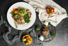 하루 한 끼, 식사 줄이기 열풍… 건강하게 따라하는 법 a white plate topped with meat and veggies